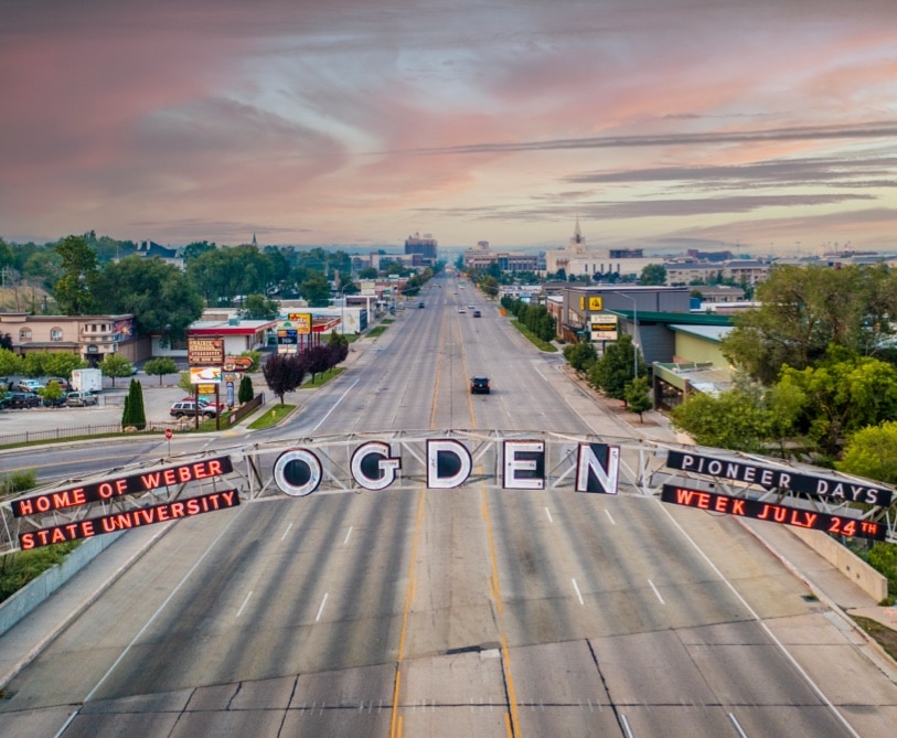 Ogden photo overlooking city and Ogden street sign