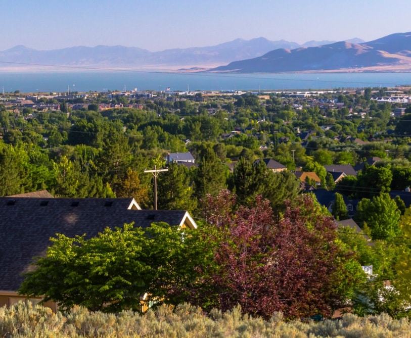 Orem photo overlooking city and lake with mountains in the background