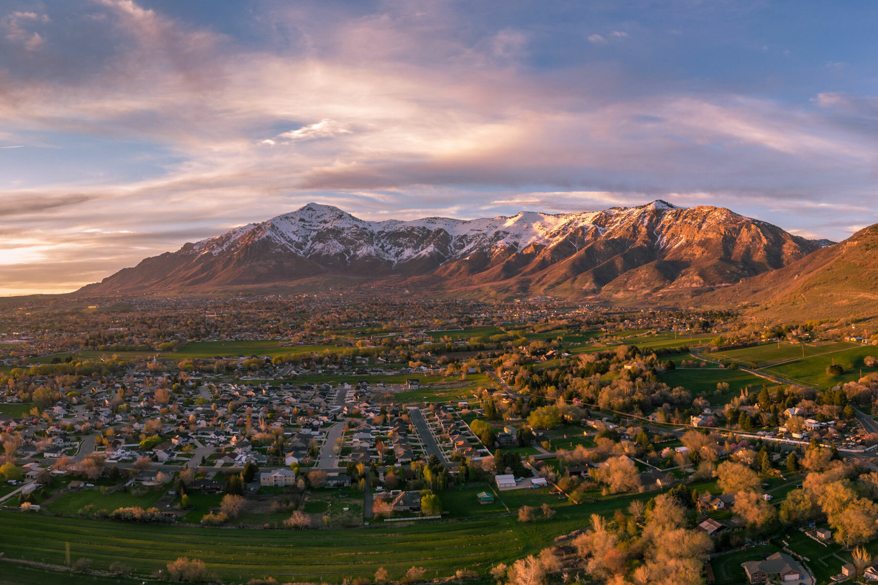 Pleasant View & North Ogden Area photo of mountains and sunset